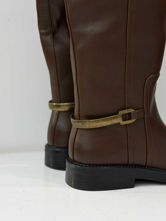 Knee-high flat boots with metal strap detail