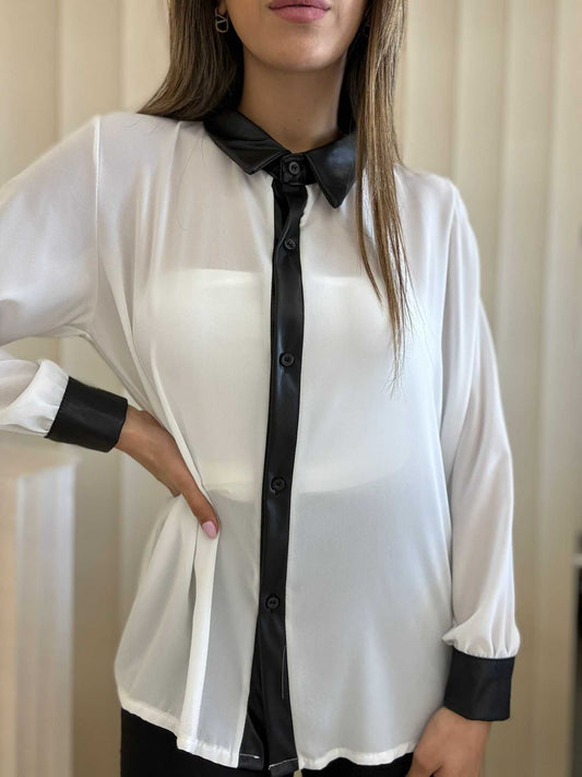 White long sleeve blouse with black contrast collar and button placket