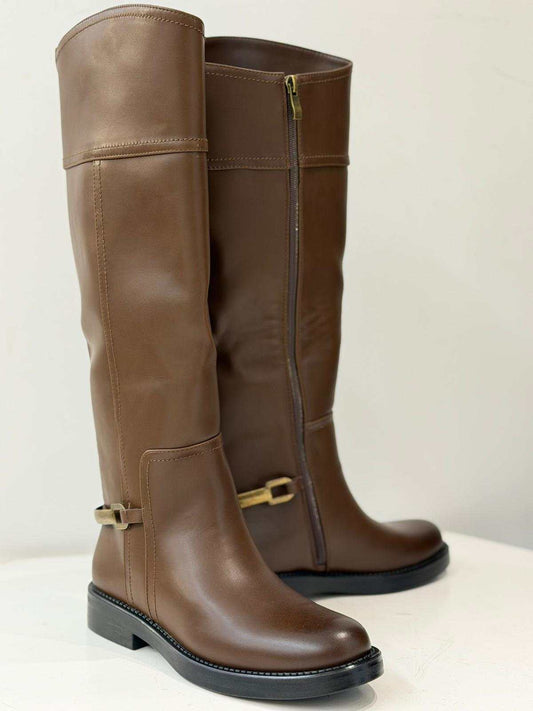 Women's knee-high flat boots with metal ankle strap and side zipper in black and brown