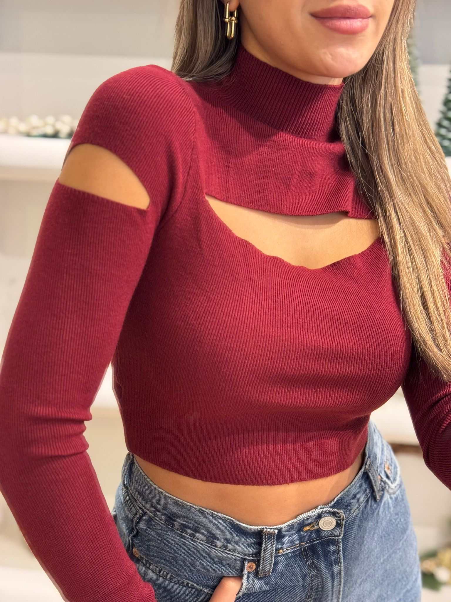 Women’s burgundy ribbed knit crop top with cutout neckline and long sleeves